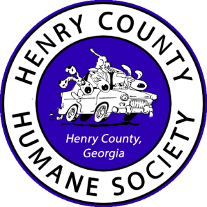 Society Logo with cartoon drawing of dogs in a car